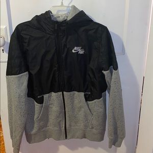 grey and black nike windbreaker